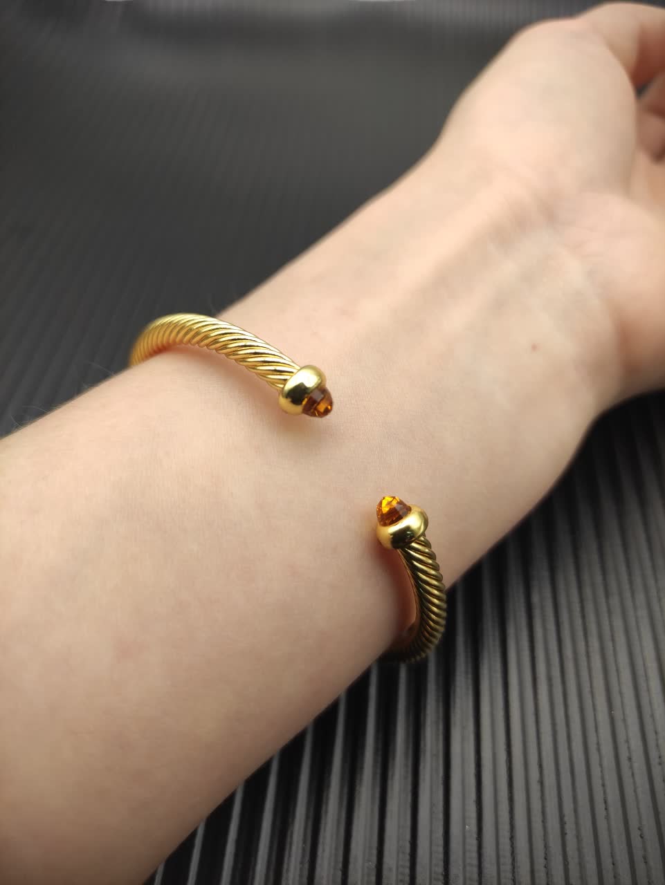 David Yurman Gold Tone Wire Bangle Bracelet with Orange Crystal Accents David Yurman Gold Tone Wire Bangle Bracelet with Orange Crystal Accents